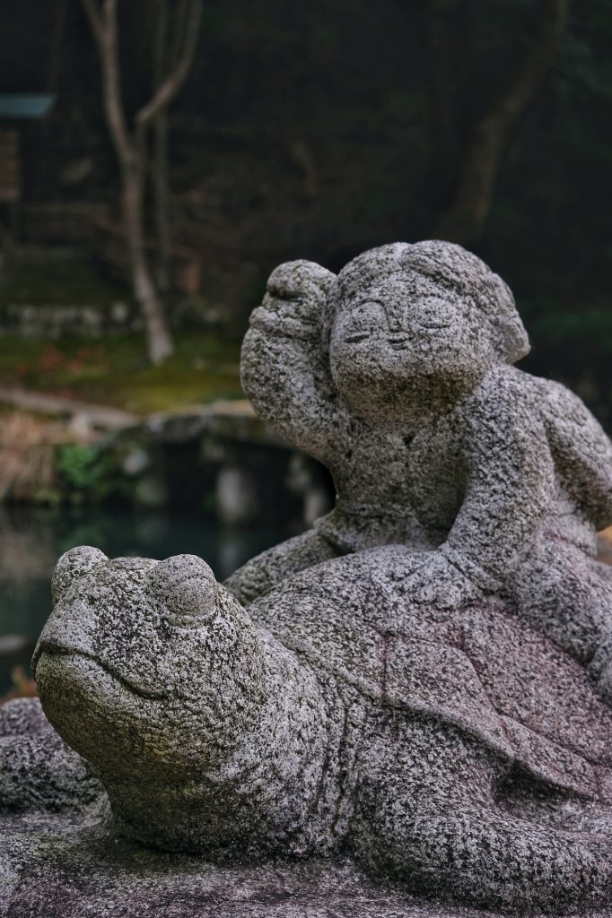 Statue devant l'étang de Tenjinsha